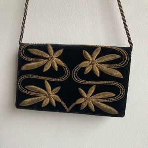 velvet and gold embroidered bag